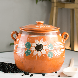 Terracota pot with lid.
